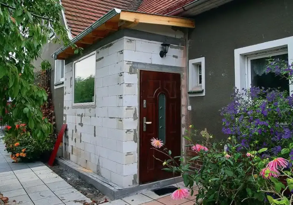 Nowoczesny wiatrołap zewnętrzny: Projekt, budowa, koszty i inspiracje
